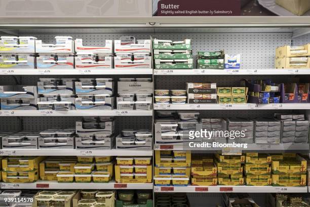 Packets of butter and margarine spreads sit on display inside a J Sainsbury Plc supermarket in Redhill, U.K., on Tuesday, March 27, 2018. Mike Coupe,...