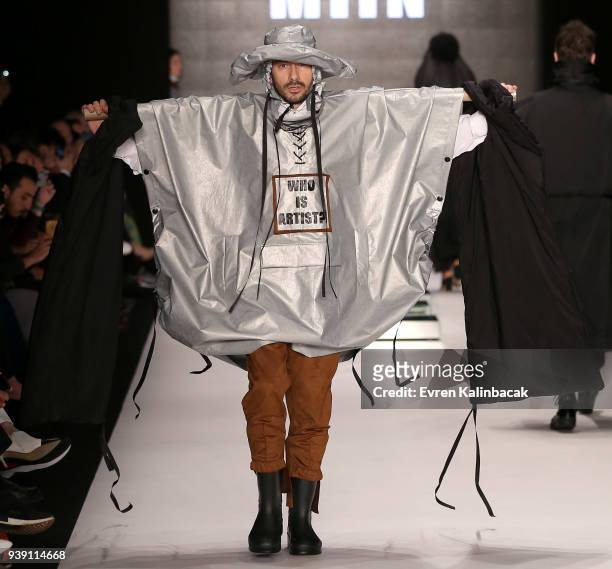 Model walks the runway at the Miin by Kadir Kilic show during Mercedes Benz Fashion Week Istanbul at Zorlu Performance Hall on March 28, 2018 in...
