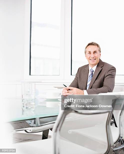 portrait of a businessman - chairman stock pictures, royalty-free photos & images