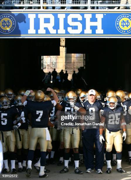 Members of the Notre Dame Fighting Irish wait to walk out of the tunnel before lining up to enter the field for a game against the Univeristy of...