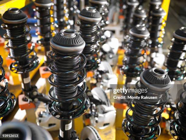 car parts lined up in plant - shock absorber stock pictures, royalty-free photos & images