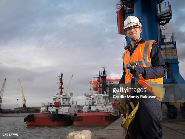 port worker with ships - boat helm stock-fotos und bilder