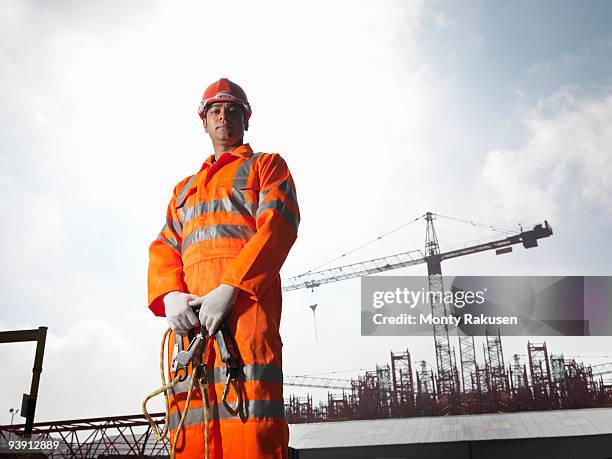 worker with cranes - construction worker stock pictures, royalty-free photos & images