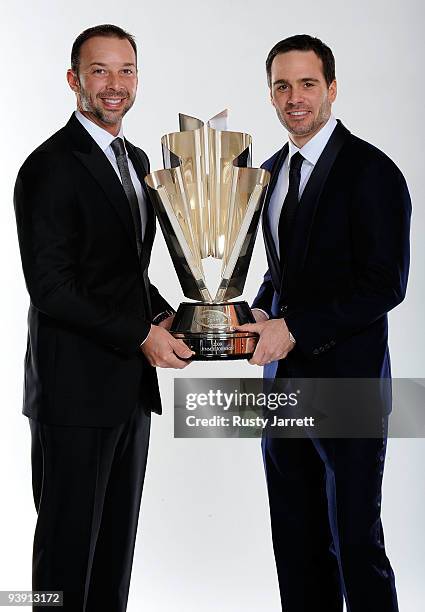 Four time NASCAR Sprint Cup Series Champion Jimmie Johnson and crew chief Chad Knaus pose before the NASCAR Sprint Cup Series awards banquet during...