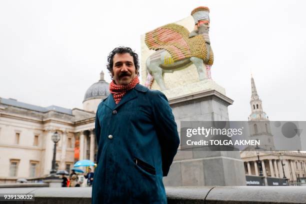 Iraqi-American artist Michael Rakowitz poses in front of his sculpture "The Invisible Enemy Should Not Exist" standing on the Fourth Plinth in...