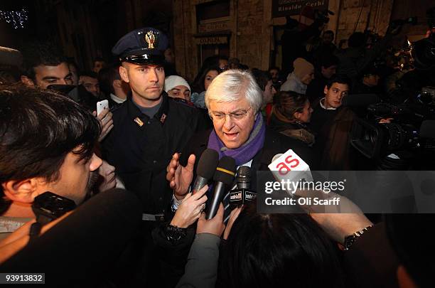 Luciano Ghirga , Amanda Knox's defense lawyer, gives an interview to the assembled media outside the courtroom following the guilty verdict on...