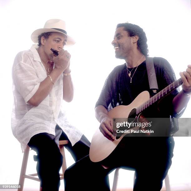 Portrait of blues musicians Billy Branch, left, and Kenny Neal in a studio in Chicago, Illinois, June 25, 2004.