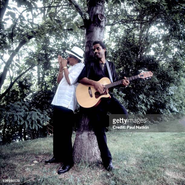 Portrait of blues musicians Billy Branch, left, and Kenny Neal outdoors in Chicago, Illinois, June 25, 2004.