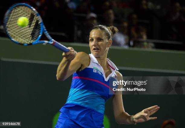 Karolina Pliskova, from the Czech Republic, in action against Victoria Azarenka, from Belarus, during her fourth round match at the Miami Open....
