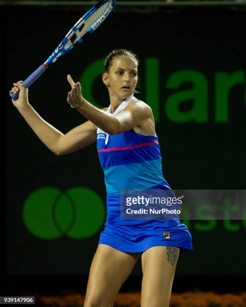 Karolina Pliskova, from the Czech Republic, in action against Victoria Azarenka, from Belarus, during her fourth round match at the Miami Open....