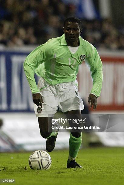 Julius Aghahowa of Nigeria runs with the ball during the International Friendly match between Scotland and Nigeria played at the Pittodrie Stadium,...