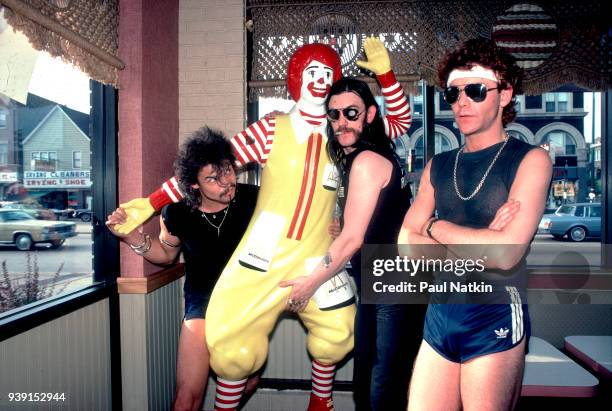 Portrait of the British metal band Motorhead at a McDonald's restaurant in Chicago, Illinois, August 5, 1983. Left to right, Phil Taylor, Ian 'Lemmy'...