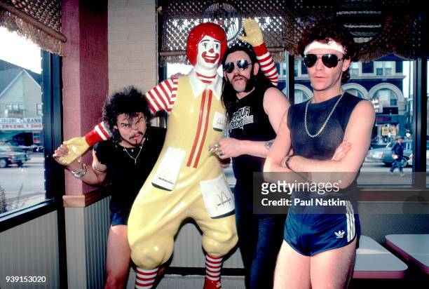 Portrait of the British metal band Motorhead at a McDonald's restaurant in Chicago, Illinois, August 5, 1983. Left to right, Phil Taylor, Ian 'Lemmy'...