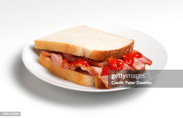 bacon sandwich with ketchup, close up - bacon sandwich stock pictures, royalty-free photos & images