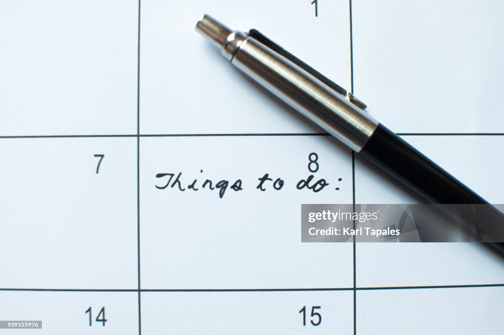 A calendar with things to do note on it