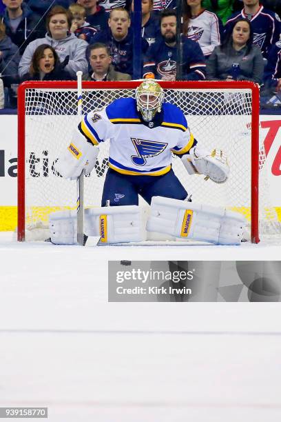 Jake Allen of the St. Louis Blues follows the puck during the game against the Columbus Blue Jackets on March 24, 2018 at Nationwide Arena in...