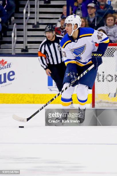 Jordan Schmaltz of the St. Louis Blues controls the puck during the game against the Columbus Blue Jackets on March 24, 2018 at Nationwide Arena in...