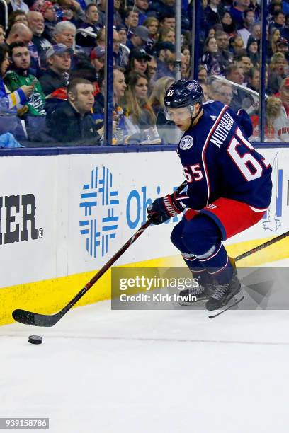 Markus Nutivaara of the Columbus Blue Jackets controls the puck during the game against the St. Louis Blues on March 24, 2018 at Nationwide Arena in...