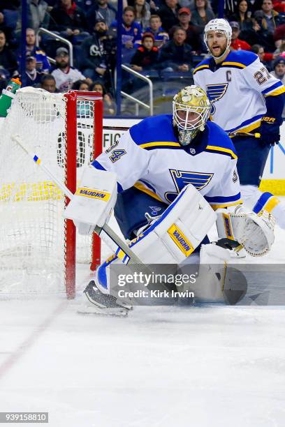 Jake Allen of the St. Louis Blues follows the puck during the game against the Columbus Blue Jackets on March 24, 2018 at Nationwide Arena in...