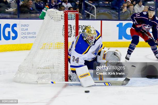 Jake Allen of the St. Louis Blues makes a save during the game against the Columbus Blue Jackets on March 24, 2018 at Nationwide Arena in Columbus,...