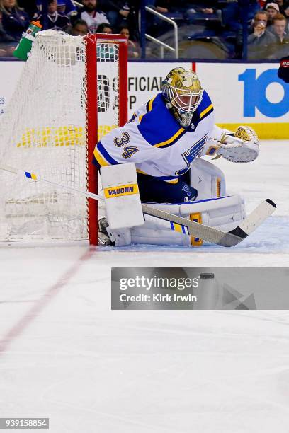 Jake Allen of the St. Louis Blues makes a save during the game against the Columbus Blue Jackets on March 24, 2018 at Nationwide Arena in Columbus,...