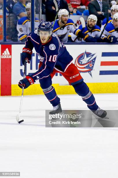 Alexander Wennberg of the Columbus Blue Jackets controls the puck during the game against the St. Louis Blues on March 24, 2018 at Nationwide Arena...