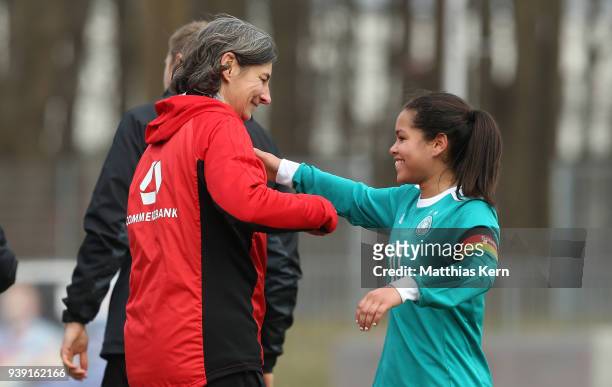 Head coach Anouschka Bernhard of Germany and Ivana Fuso show their delight after winning the UEFA U17 Girl's European Championship Qualifier match...