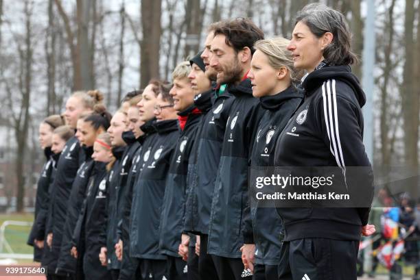 Head coach Anouschka Bernhard of Germany and her team look on prior to the UEFA U17 Girl's European Championship Qualifier match between Germany and...