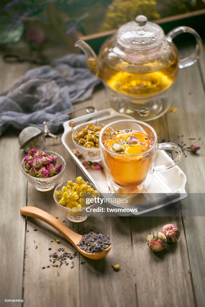 Assorted herbal tea ingredients; dried flowers and leaves.