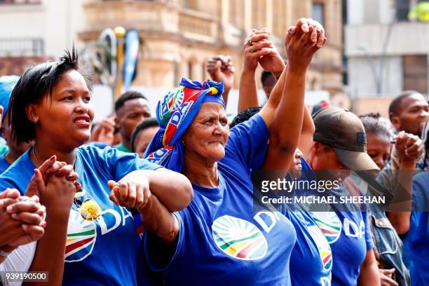 South African main opposition party Democratic Alliance Port Elizabeth mayor Athol Trollip supporters demonstrate in front of the city hall at a...