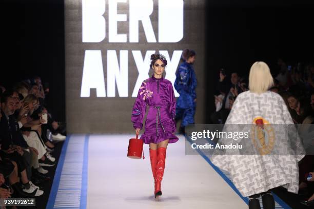 Model presents creations of designer Deniz Berdan during the Mercedes-Benz Fashion Week / Fall Season 2018 at the Zorlu Performing Arts Center in...