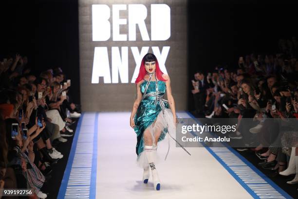 Model presents creations of designer Deniz Berdan during the Mercedes-Benz Fashion Week / Fall Season 2018 at the Zorlu Performing Arts Center in...