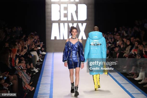 Model presents creations of designer Deniz Berdan during the Mercedes-Benz Fashion Week / Fall Season 2018 at the Zorlu Performing Arts Center in...