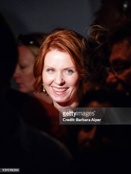 View of American actress Cynthia Nixon as she attends the Badgley Mischka Spring 2004 Fashion Show in a tent at Bryant Park, New York, New York,...