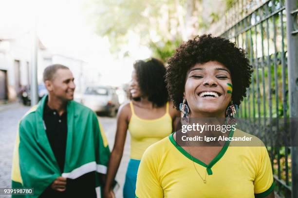 the joy of cheering for brazilian soccer team - rio de janeiro street stock pictures, royalty-free photos & images
