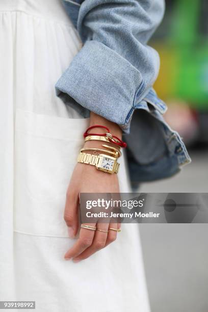 Aylin Koenig wearing a Levis Jeans jacket, Cartier jewelry, Zara dress on March 27, 2018 in Hamburg, Germany. .