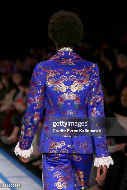 Model walks the runway for the DB Berdan show during Mercedes Benz Fashion Week Istanbul at Zorlu Center on March 28, 2018 in Istanbul, Turkey.