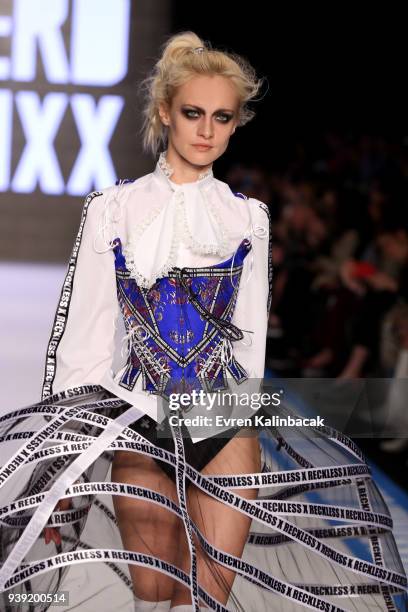 Model walks the runway for the DB Berdan show during Mercedes Benz Fashion Week Istanbul at Zorlu Center on March 28, 2018 in Istanbul, Turkey.