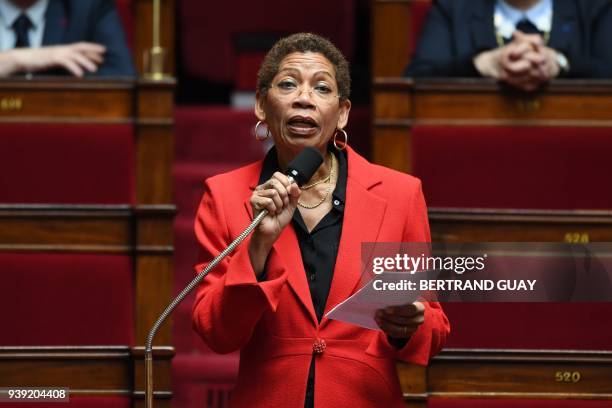 French Nouvelle Gauche party MP George Pau-Langevin speaks during a session of questions to the government at the French National Assembly in Paris...