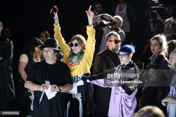 Oner Evez and fashion designers Deniz Berdan, Begum Berdan ahead of the DB Berdan show during Mercedes Benz Fashion Week Istanbul at Zorlu Center on...