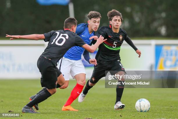 Adil Aouchiche of France and Tiago Ferreira of Portugal during the Mondial Montaigu match between France U16 and Portugal U16 on March 27, 2018 in...