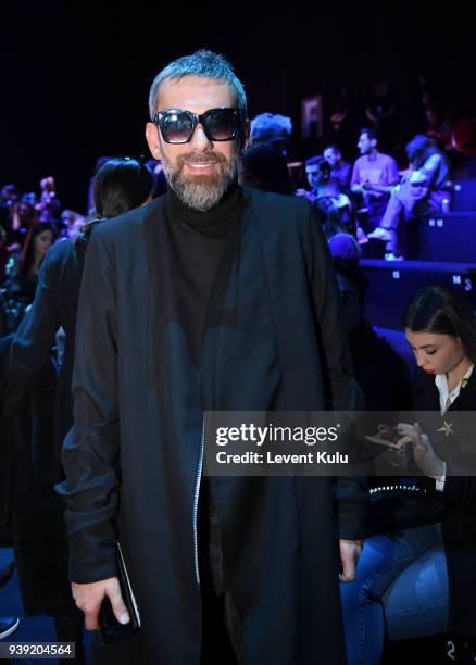 Hakan Akkaya attends the DB Berdan show during Mercedes Benz Fashion Week Istanbul at Zorlu Center on March 28, 2018 in Istanbul, Turkey.