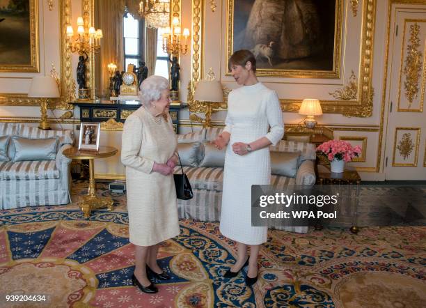 Queen Elizabeth II receives President of Estonia Kersti Kaljulaid during a private audience at Buckingham Palace on March 28, 2018 in London, England.