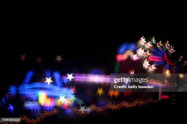 amusement park funfair fairground lights - kelly bowden stock pictures, royalty-free photos & images