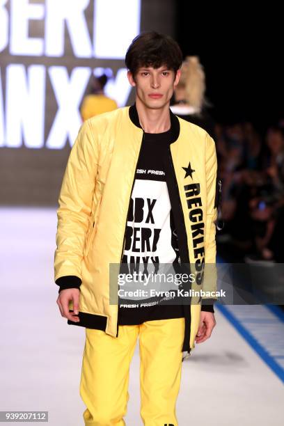 Model walks the runway for the DB Berdan show during Mercedes Benz Fashion Week Istanbul at Zorlu Center on March 28, 2018 in Istanbul, Turkey.