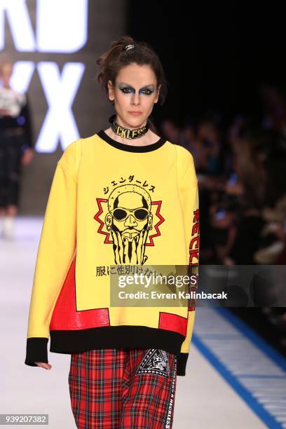 Model walks the runway for the DB Berdan show during Mercedes Benz Fashion Week Istanbul at Zorlu Center on March 28, 2018 in Istanbul, Turkey.