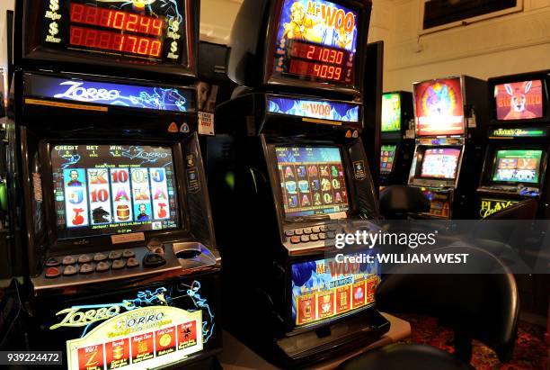 Photo taken in Melbourne on April 13 shows a general view taken inside a gaming venue with poker machines. An Australian MP leading a push against...