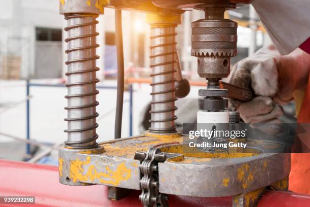 construction worker drill steel metal - machining shops stock pictures, royalty-free photos & images