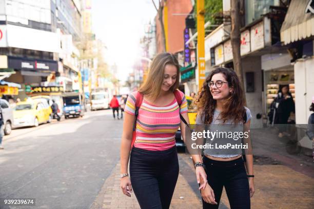 friends traveling abroad to asia - ximen stock pictures, royalty-free photos & images