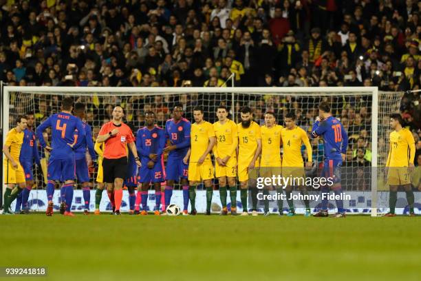 Wall Australia Milos Degenek, Tom Rogic, Mile Jedinak, Mark Milligan and Tim Cahill of Australia, James Rodriguez of Colombia during the...